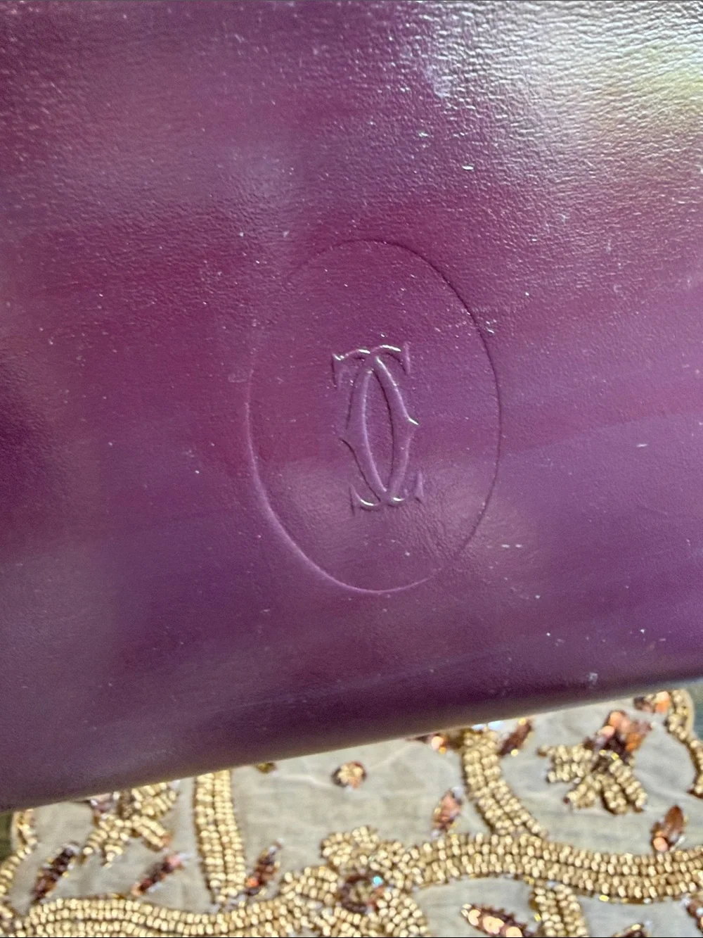 Cartier Plum Leather Embossed Fold Clutch